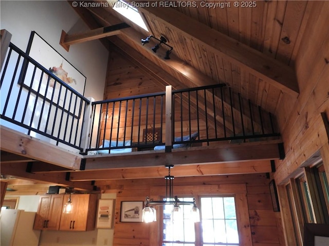 5609 Hurricane Creek Rd, Hurricane, WV 25526 - stairway with wooden walls, high vaulted ceiling, and beamed ceiling