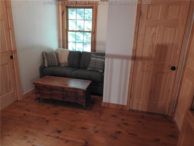 5609 Hurricane Creek Rd, Hurricane, WV 25526 - living area featuring hardwood / wood-style flooring and baseboards