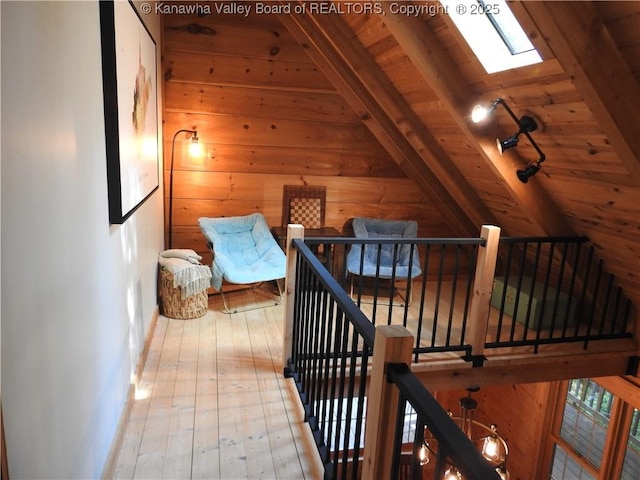 5609 Hurricane Creek Rd, Hurricane, WV 25526 - hall with an upstairs landing, wooden ceiling, hardwood / wood-style floors, a skylight, and wooden walls