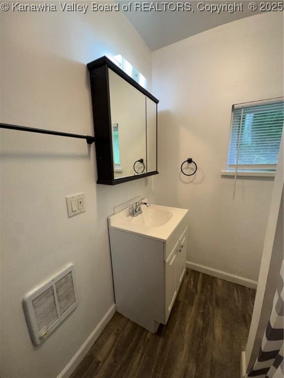 292 Maysel Laurel Ridge Rd, Wv, WV 25133 - bathroom with wood finished floors and vanity