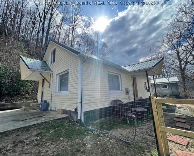 292 Maysel Laurel Ridge Rd, Wv, WV 25133 - view of side of property featuring a metal roof