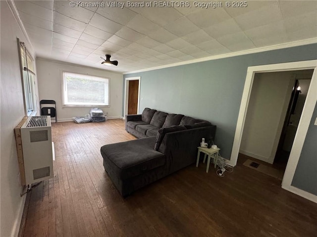 292 Maysel Laurel Ridge Rd, Wv, WV 25133 - living room featuring heating unit, hardwood / wood-style floors, and ornamental molding
