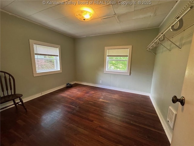 292 Maysel Laurel Ridge Rd, Wv, WV 25133 - empty room featuring healthy amount of natural light, wood-type flooring, and crown molding