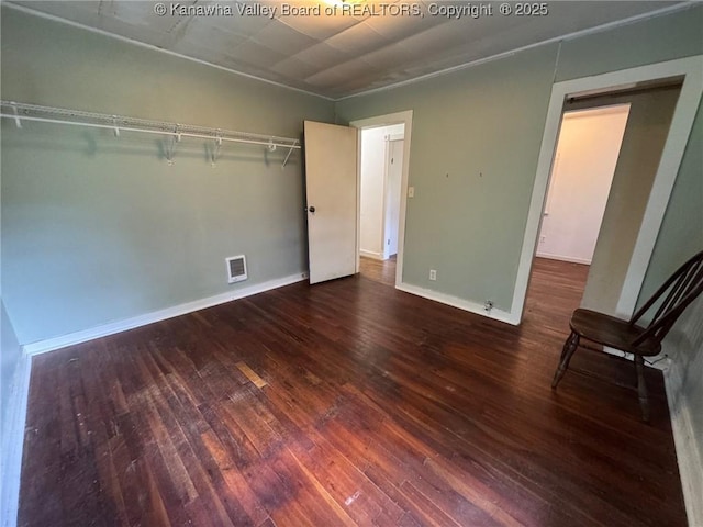 292 Maysel Laurel Ridge Rd, Wv, WV 25133 - unfurnished bedroom featuring wood-type flooring and baseboards