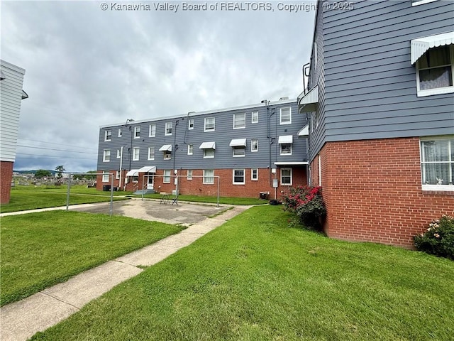415 Kenna Dr Unit 94, South Charleston, WV 25309 - surrounding community featuring a yard and a patio area