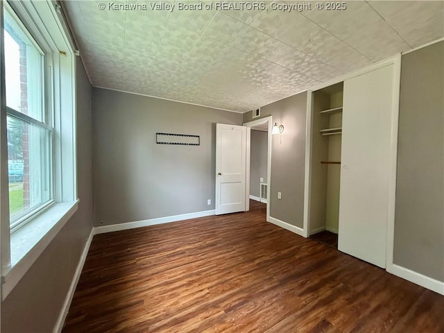 415 Kenna Dr Unit 94, South Charleston, WV 25309 - unfurnished bedroom featuring wood finished floors and a closet