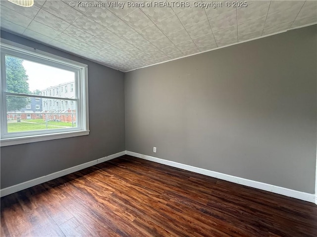 415 Kenna Dr Unit 94, South Charleston, WV 25309 - empty room featuring dark wood-style flooring and baseboards