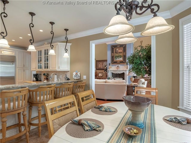 948 Little Coal River Rd, Alum Creek, WV 25003 - dining area with ornamental molding, a chandelier, recessed lighting, and healthy amount of natural light