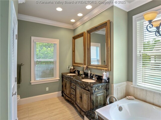 948 Little Coal River Rd, Alum Creek, WV 25003 - full bath with double vanity, a bath, ornamental molding, and recessed lighting