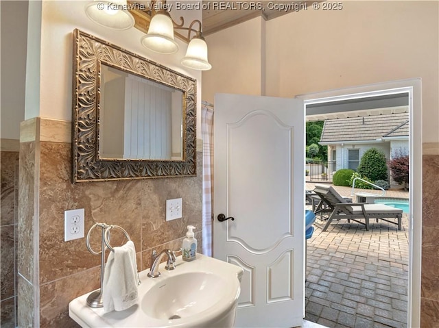 948 Little Coal River Rd, Alum Creek, WV 25003 - bathroom featuring brick flooring and tile walls
