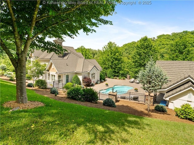 948 Little Coal River Rd, Alum Creek, WV 25003 - back of house with a tile roof, stucco siding, and a patio area