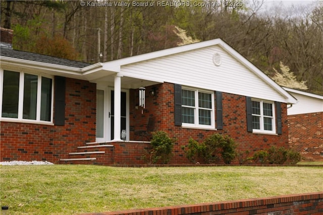 35 Belpac Cir, Logan, WV 25601 - view of front of property featuring brick siding and a front lawn