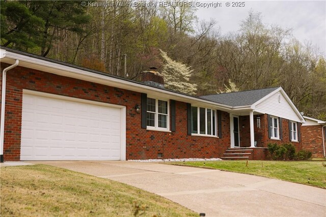 35 Belpac Cir, Logan, WV 25601 - ranch-style house featuring driveway, brick siding, a chimney, and a front lawn