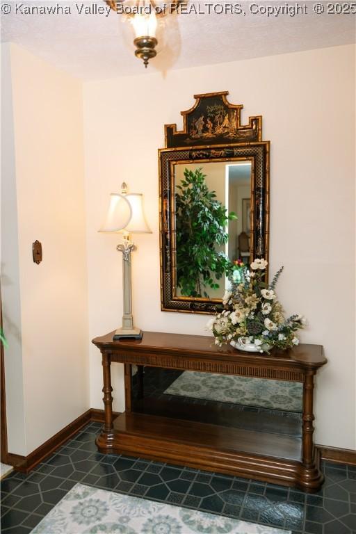 35 Belpac Cir, Logan, WV 25601 - corridor with baseboards and dark tile patterned floors