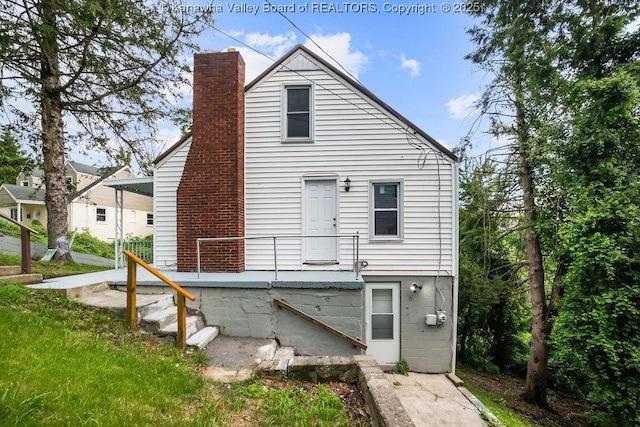 528 Medina St, Charleston, WV 25302 - back of house with a chimney