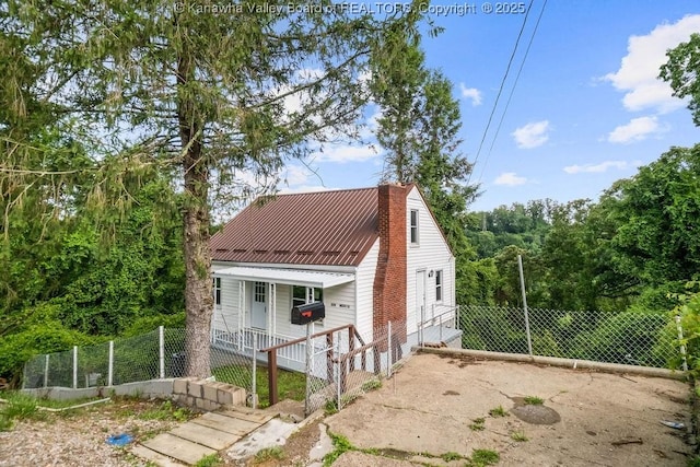528 Medina St, Charleston, WV 25302 - view of front of home with covered porch and a metal roof