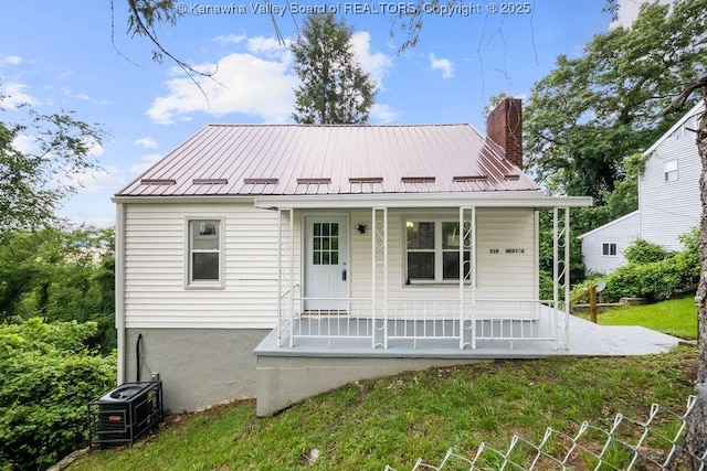 528 Medina St, Charleston, WV 25302 - view of front of property with a porch, a chimney, and a metal roof