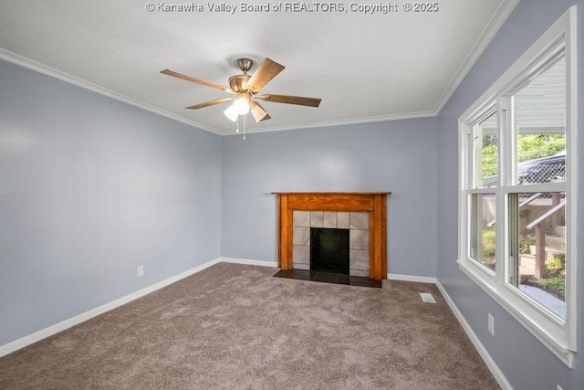 528 Medina St, Charleston, WV 25302 - unfurnished living room featuring carpet flooring, a fireplace, ceiling fan, and crown molding