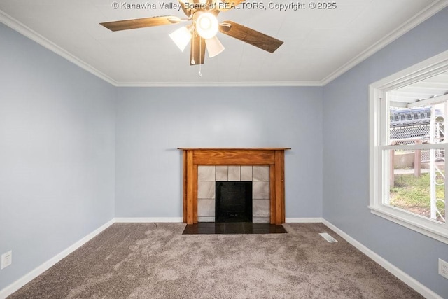 528 Medina St, Charleston, WV 25302 - unfurnished living room with carpet floors, healthy amount of natural light, a tiled fireplace, ceiling fan, and crown molding