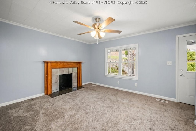 528 Medina St, Charleston, WV 25302 - unfurnished living room with ornamental molding, carpet floors, ceiling fan, and a tile fireplace