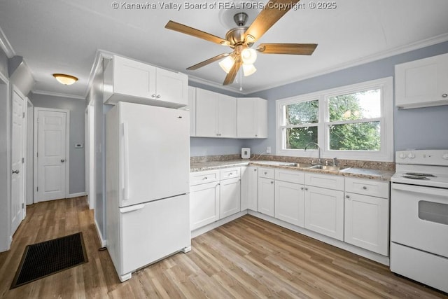528 Medina St, Charleston, WV 25302 - kitchen featuring white appliances, crown molding, light wood-type flooring, white cabinets, and ceiling fan