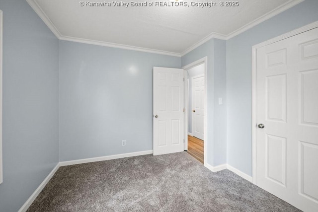 528 Medina St, Charleston, WV 25302 - unfurnished bedroom featuring carpet floors and crown molding