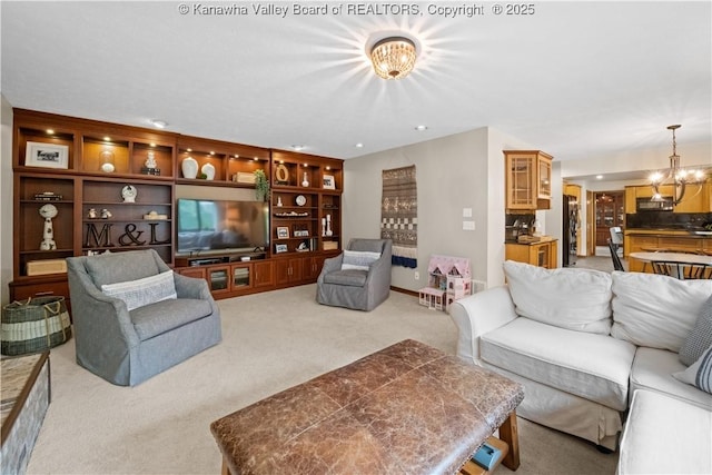 137 Summit Ridge Rd, Hurricane, WV 25526 - living area featuring a chandelier and light carpet
