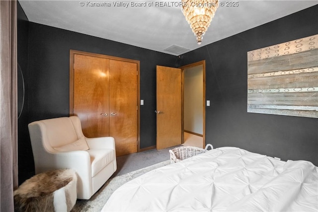 137 Summit Ridge Rd, Hurricane, WV 25526 - bedroom with carpet floors and a chandelier