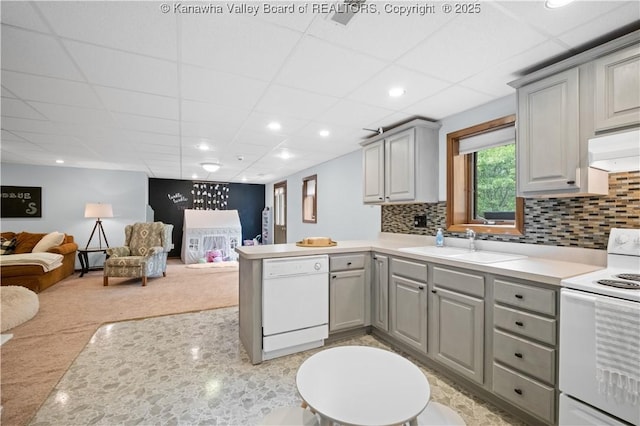 137 Summit Ridge Rd, Hurricane, WV 25526 - kitchen featuring white appliances, gray cabinets, a peninsula, open floor plan, and under cabinet range hood