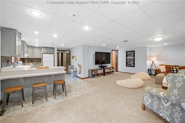 137 Summit Ridge Rd, Hurricane, WV 25526 - living area featuring light carpet and a drop ceiling