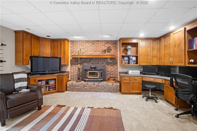 137 Summit Ridge Rd, Hurricane, WV 25526 - office featuring a paneled ceiling, light colored carpet, recessed lighting, a wood stove, and built in desk