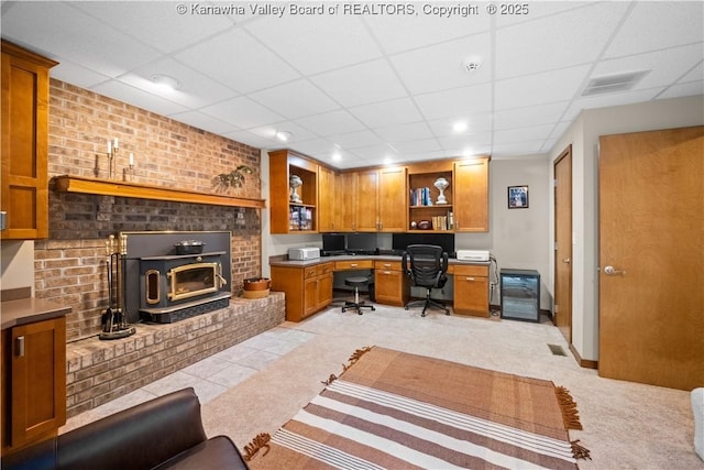 137 Summit Ridge Rd, Hurricane, WV 25526 - office with light carpet, a drop ceiling, brick wall, and built in study area