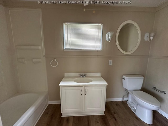 2309 Jefferson Ave, Point Pleasant, WV 25550 - bathroom featuring wood finished floors, vanity, and washtub / shower combination