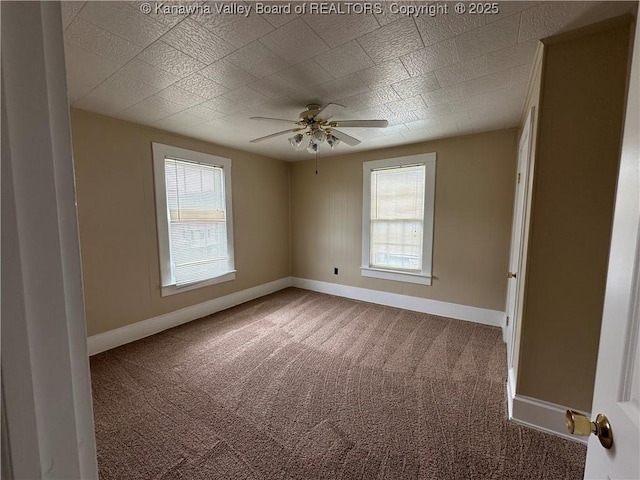2309 Jefferson Ave, Point Pleasant, WV 25550 - carpeted empty room featuring plenty of natural light and ceiling fan
