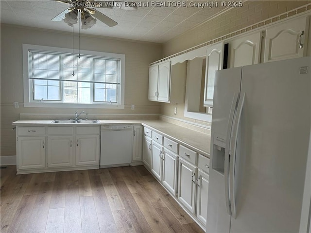 2309 Jefferson Ave, Point Pleasant, WV 25550 - kitchen with white appliances, ornamental molding, light wood-style flooring, a ceiling fan, and white cabinets