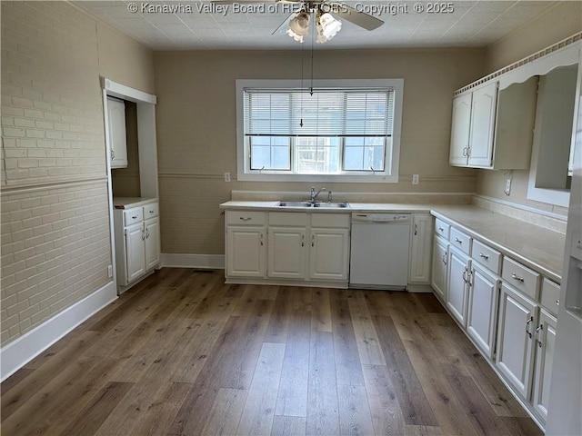 2309 Jefferson Ave, Point Pleasant, WV 25550 - kitchen featuring dishwasher, ceiling fan, brick wall, hardwood / wood-style flooring, and white cabinetry