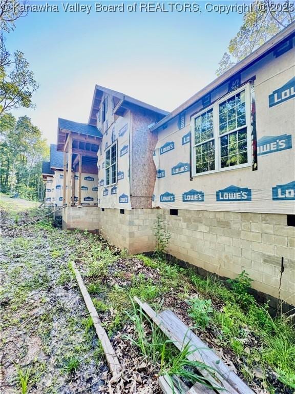 71 Deer Run, Sumerco, WV 25567 - view of side of property with crawl space