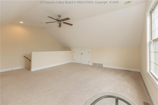 705 Christian Dr, Charleston, WV 25314 - additional living space with vaulted ceiling, a ceiling fan, light carpet, plenty of natural light, and recessed lighting