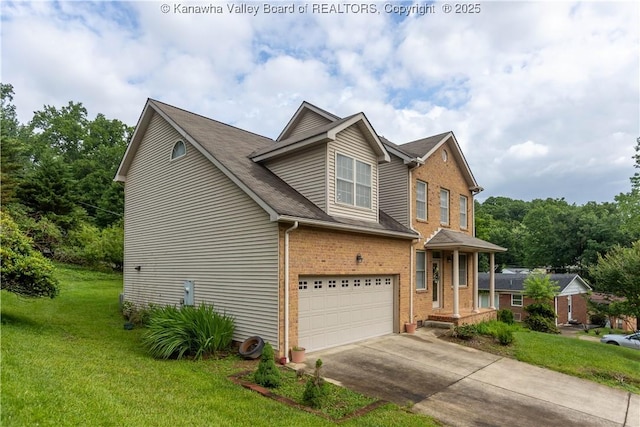 705 Christian Dr, Charleston, WV 25314 - traditional-style home featuring brick siding, a garage, driveway, and a front yard