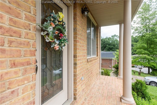 705 Christian Dr, Charleston, WV 25314 - entrance to property with covered porch and brick siding