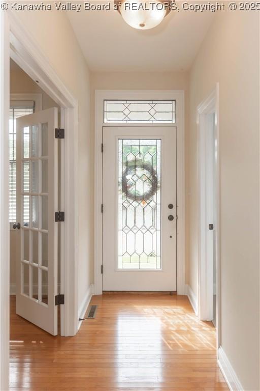 705 Christian Dr, Charleston, WV 25314 - foyer entrance featuring light wood-style floors and baseboards