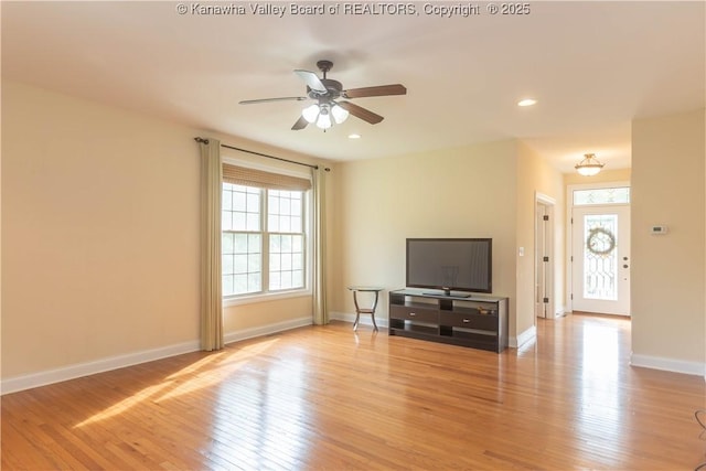 705 Christian Dr, Charleston, WV 25314 - living area with wood finished floors, ceiling fan, and recessed lighting