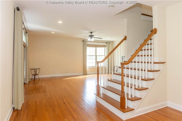 705 Christian Dr, Charleston, WV 25314 - stairs with wood finished floors, ceiling fan, and recessed lighting
