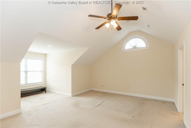 705 Christian Dr, Charleston, WV 25314 - additional living space with vaulted ceiling, light carpet, and a ceiling fan