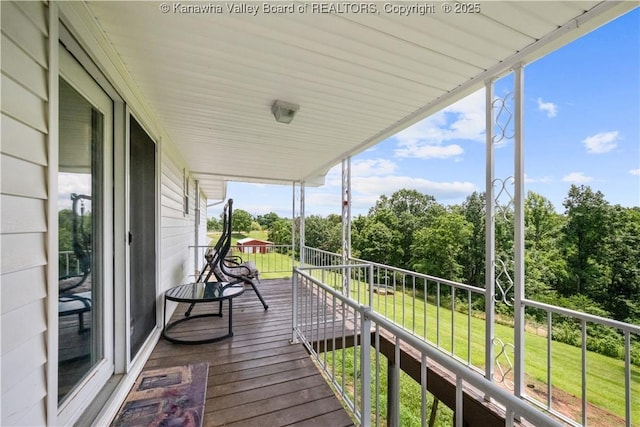 733 Divide Ridge Rd, Given, WV 25245 - wooden deck with a lawn and view of wooded area