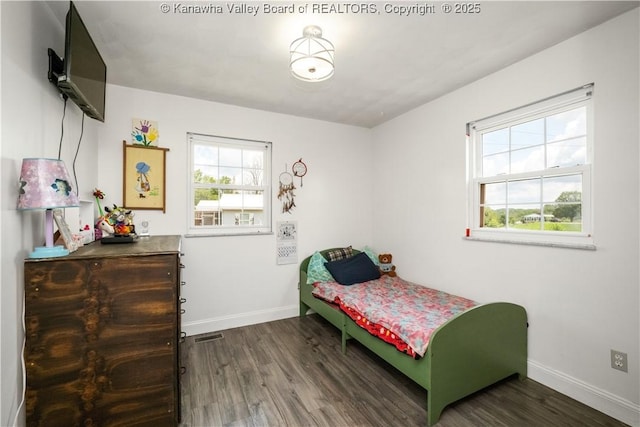 733 Divide Ridge Rd, Given, WV 25245 - bedroom featuring wood finished floors and baseboards