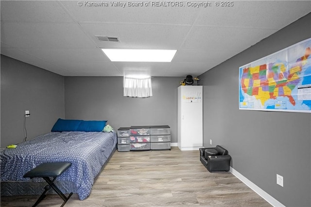 733 Divide Ridge Rd, Given, WV 25245 - bedroom with wood finished floors and a paneled ceiling