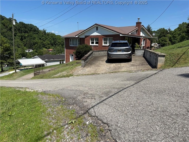 123 2nd St, Burnsville, WV 26335 - bungalow-style home with brick siding