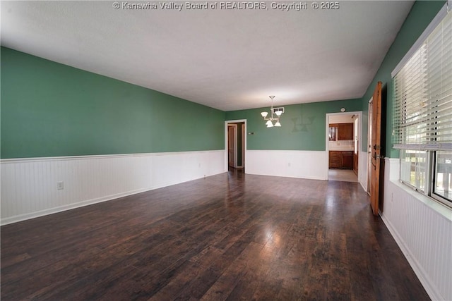 2620 Bard Ave, Saint Albans, WV 25177 - unfurnished room with wood-type flooring, a chandelier, and wainscoting