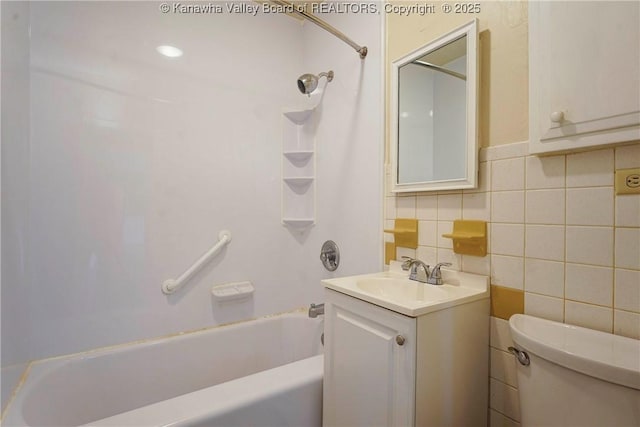 2620 Bard Ave, Saint Albans, WV 25177 - full bathroom featuring vanity,  shower combination, tile walls, and tasteful backsplash